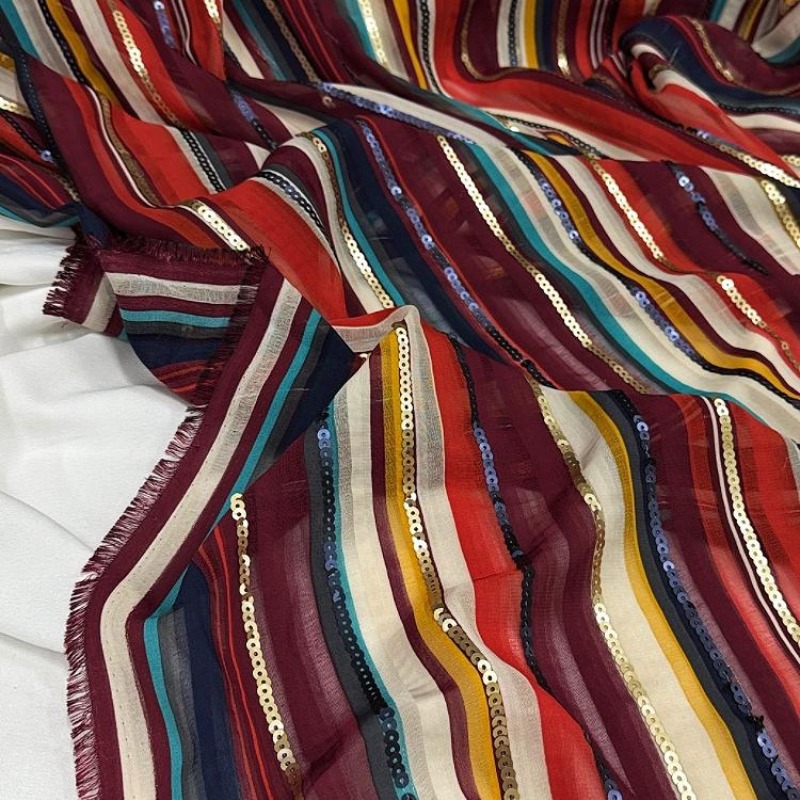 Ethnic Fashion Design - Bunt gestreifter bestickter Paillettenstoff im Ethno-Stil,